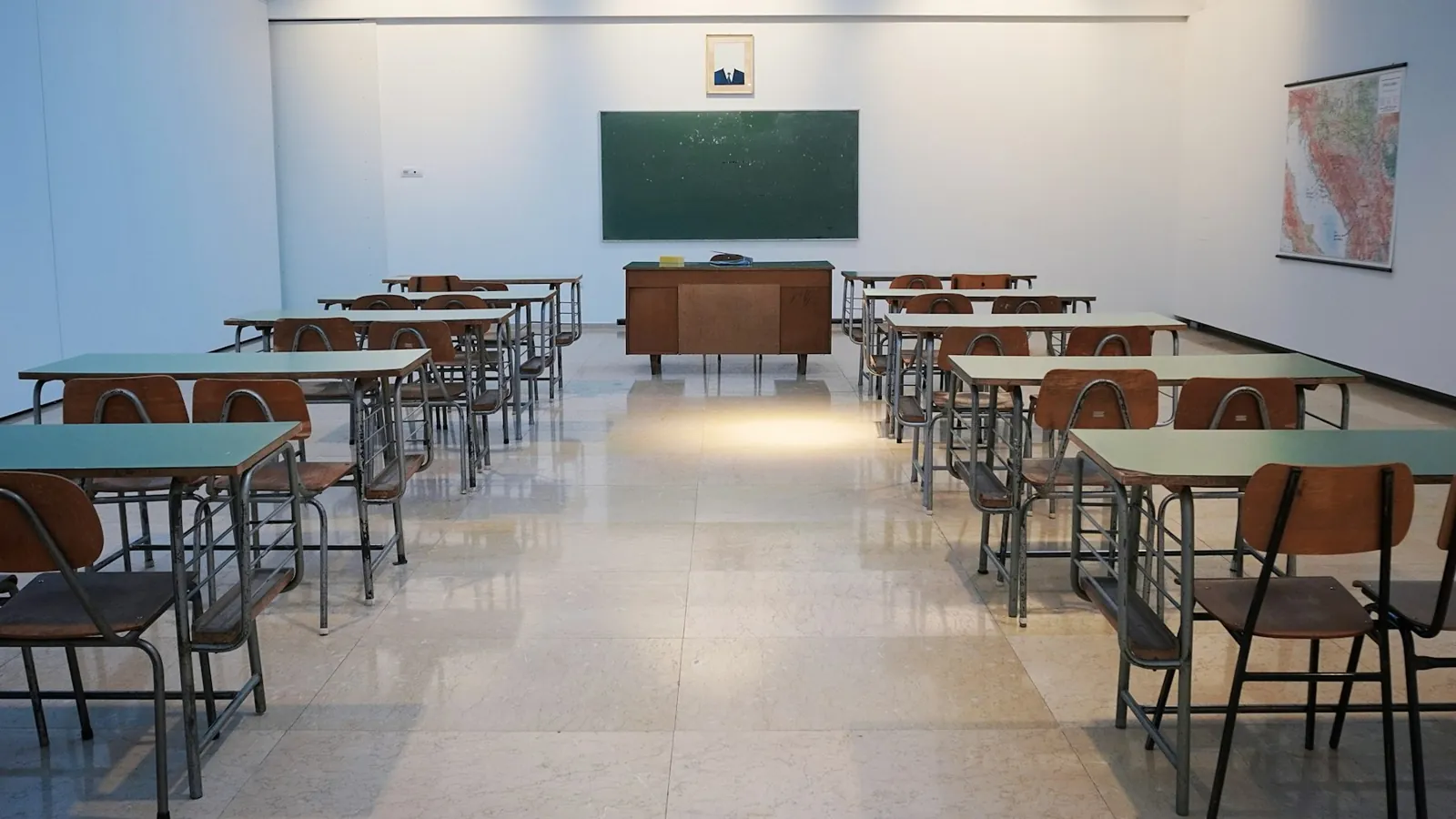 Empty classroom with rows of desks